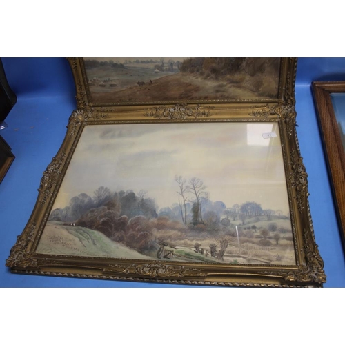 77 - A PAIR OF FRAMED AND GLAZED PRINTS DEPICTING COUNTRYSIDE SCENES