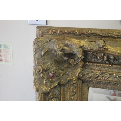 98 - A VERY LARGE GILT MIRROR  185 CM X 136 CM