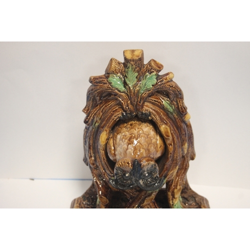 289 - A MAJOLICA FIGURE