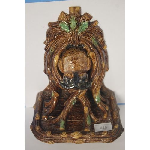 289 - A MAJOLICA FIGURE