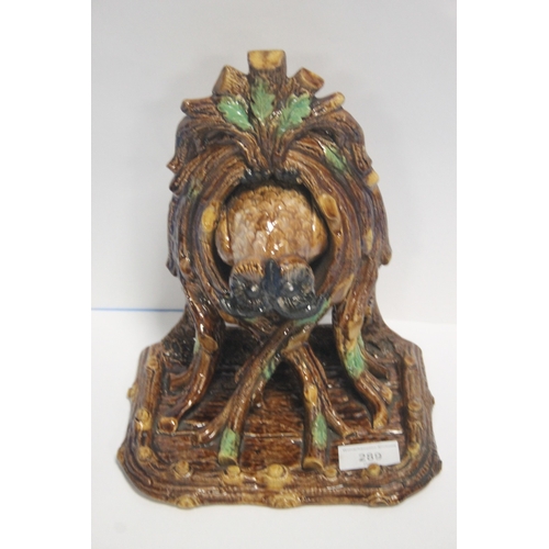 289 - A MAJOLICA FIGURE