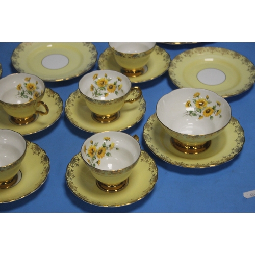 545A - A YELLOW PATTERNED TEA SET