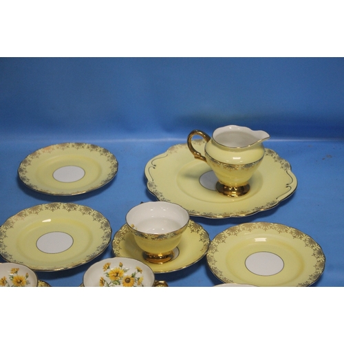 545A - A YELLOW PATTERNED TEA SET