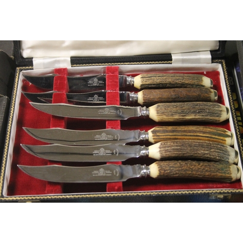 546 - A TRAY OF COLLECTIBLES AND FLATWARE TO INCLUDE A SEIKO WALL CLOCK DRESSING TABLE SET, BONE HANDLED K... 