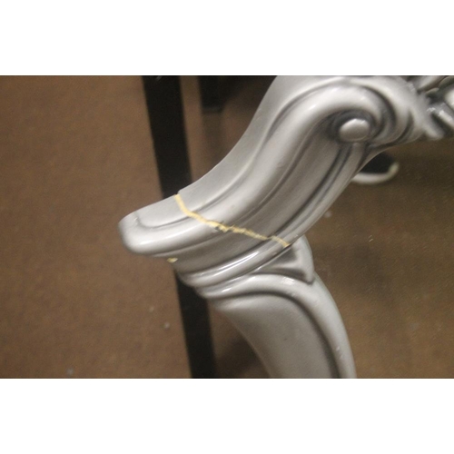 33 - A HANGING WALL MIRROR WITH PLASTIC FRAME