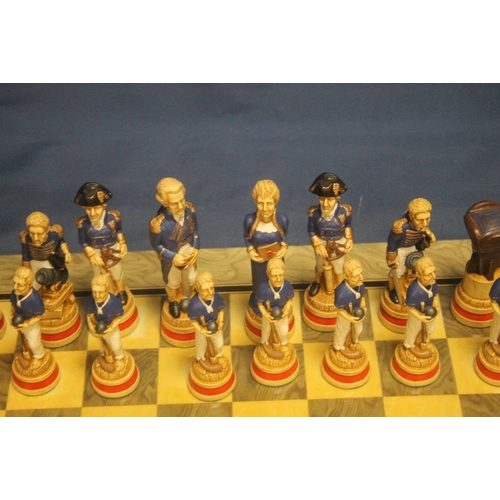 57 - A BOXED STUDIO ANNE CARLTON CHESS SET 