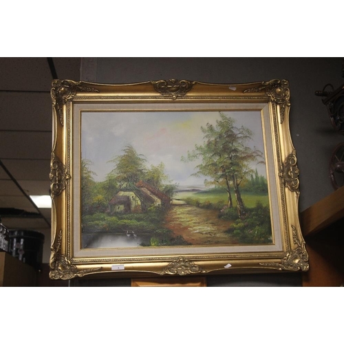 1 - A GILT FRAMED OIL ON CANVAS OF A COUNTRYSIDE SCENE 64 CM X 69 CM