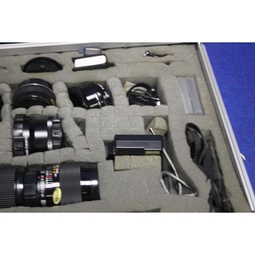 104 - A CASED COSINA CAMERA AND ACCESSORIES