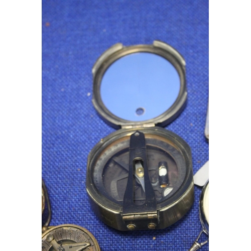 108 - A VINTAGE POCKET COMPASS TOGETHER WITH A WHITE METAL CHAIN POCKET WATCH ETC