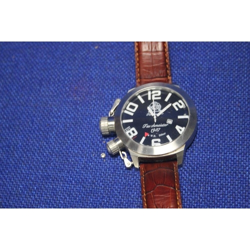 114 - A TAUCHMEISTER OVERSIZED GENTLEMANS DIVERS DIAL WRIST WATCH ON A LEATHER STRAP