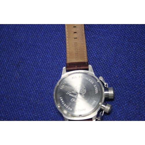 114 - A TAUCHMEISTER OVERSIZED GENTLEMANS DIVERS DIAL WRIST WATCH ON A LEATHER STRAP