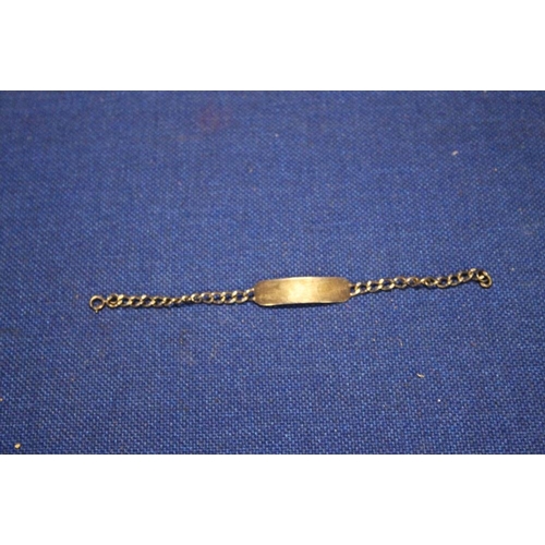 121 - A HALLMARKED SILVER IDENTITY BRACELET