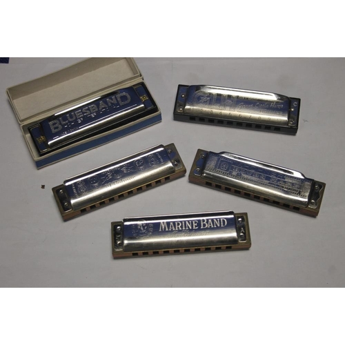 144 - A COLLECTION OF HOHNER HARMONICAS