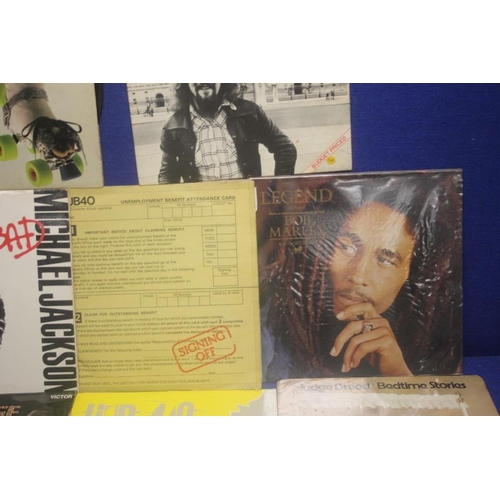 151 - TWENTY FOUR VINYL RECORDS TO INCLUDE BOB MARLEY LEGEND, UB40 UNEMPLOYMENT BENIFIT CARD, MICHAEL JACK... 