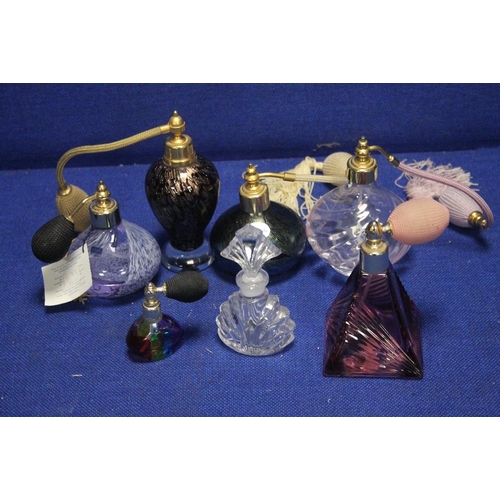 160 - A SMALL COLLECTION OF PERFUME BOTTLES