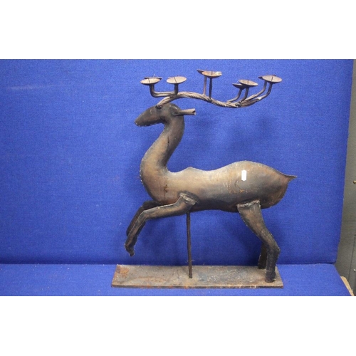 175 - A METAL CANDLE HOLDER IN THE FORM OF A DEER