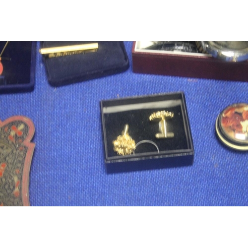 211A - A BOX OF COLLECTABLES TO INCLUDE A 28 YEAR CALENDAR. WATCHES, CUFFLINKS ETC