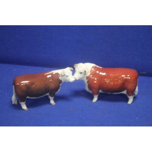 213 - TWO BESWICK HEREFORD BULLS