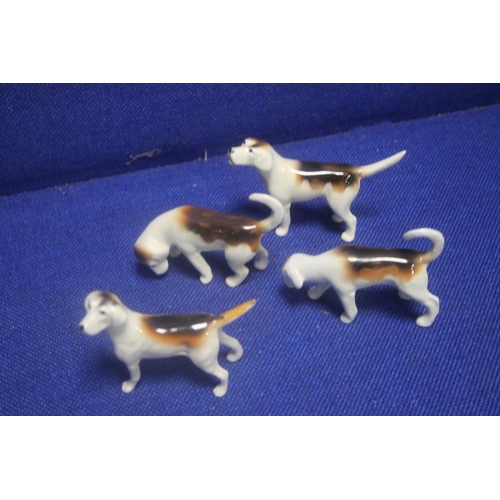 217 - FOUR BESWICK TERRIERS