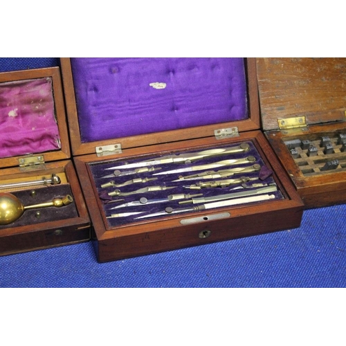 237 - TWO CASED COMPASS SETS TOGETHER WITH A CASED HYDROMETER AND A PART CASED STAMP SET