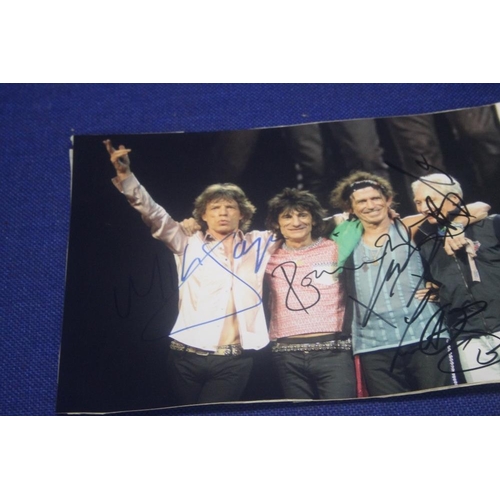 251 - SIGNED PHOTOGRAPH BY THE ROLLING STONES