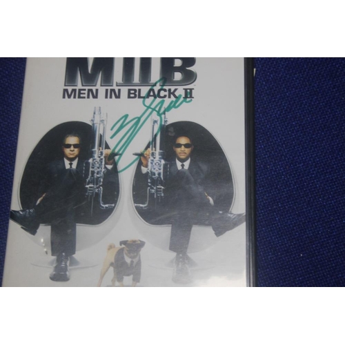 292 - A COLLECTION OF DVDS BARING SIGNATURES FOR ARNOLD SCHWARSNEGGER, JUSTIN TIMBERLAKE, KEANU, REEVES AN... 