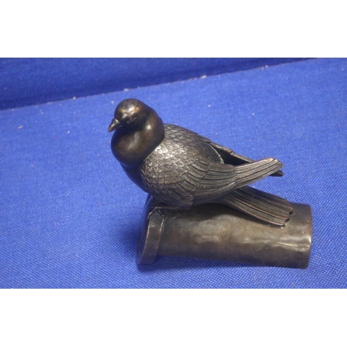 293 - A BRONZE PIGEON