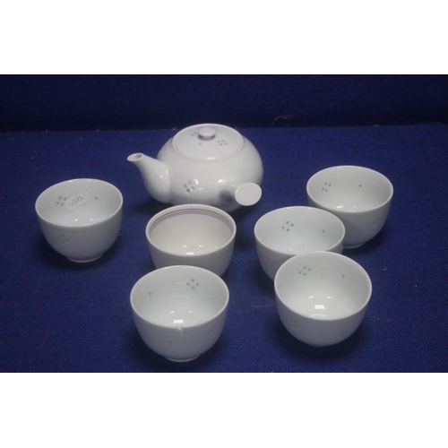 310 - A SMALL ORIENTAL TYPE COFFEE SET