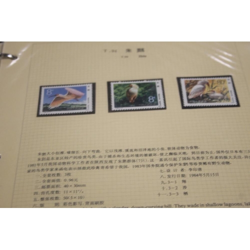 331 - A QUANTITY OF ASSORTED STAMPS IN ALBUMS TO INCLUDE CHINESE EXAMPLES