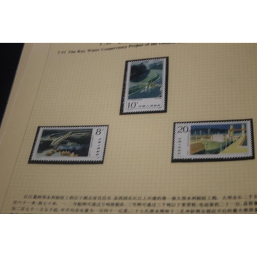 331 - A QUANTITY OF ASSORTED STAMPS IN ALBUMS TO INCLUDE CHINESE EXAMPLES