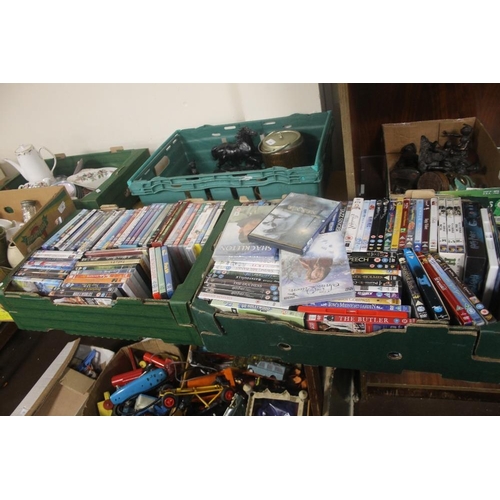 423 - TWO TRAYS OF DVDS (TRAYS NOT INCLUDED)