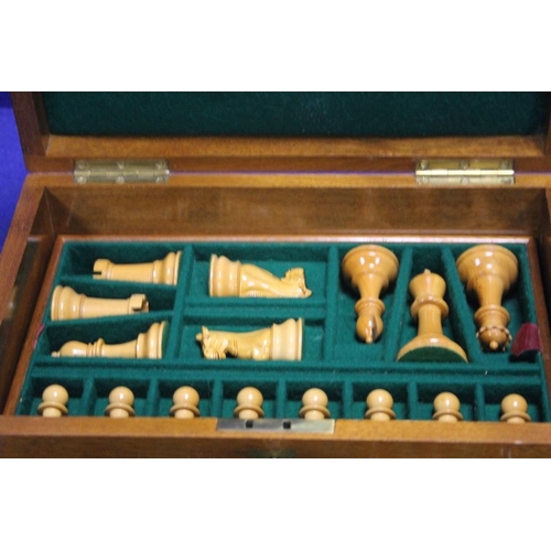 464 - A CASED STAUNTON CHESS SET AND BOARD WITH KEY