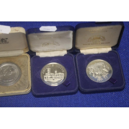 57A - A COLLECTION OF CASED COINS AND MEDALS