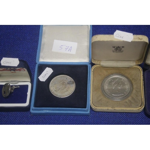 57A - A COLLECTION OF CASED COINS AND MEDALS