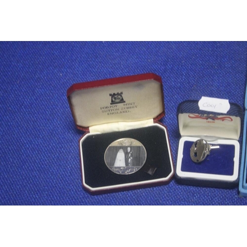 57A - A COLLECTION OF CASED COINS AND MEDALS