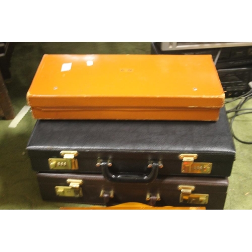 600 - A PAIR OF BRIEFCASES, A SMALL VINTAGE LEATHER CASE A WALL MOUNTED DISPLAY CABINET ETC