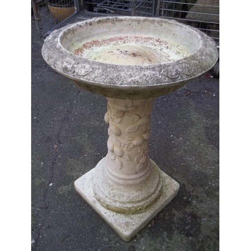 705 - A RECONSTITUTED STONE BIRD BATH