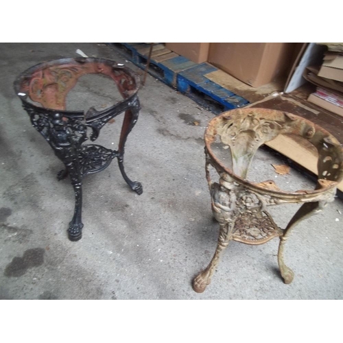 711 - TWO ROUND CAST IRON BRITTANIA TABLE BASES S/D TO 1 OF THEM