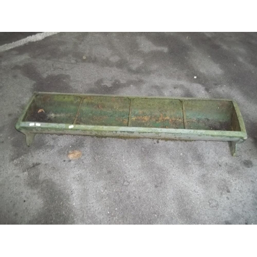 713 - A LARGE CAST IRON CHICKEN FEEDER TROUGH