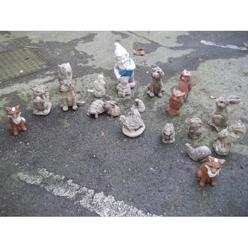 715 - A SELECTION OF CONCRETE GARDEN STATUES OF THE SMALLER VARIETY