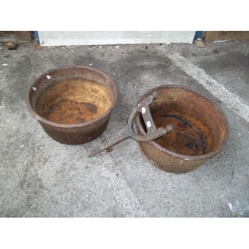 717 - TWO CAST IRON BOWLS WITH A BOOT CLEANER