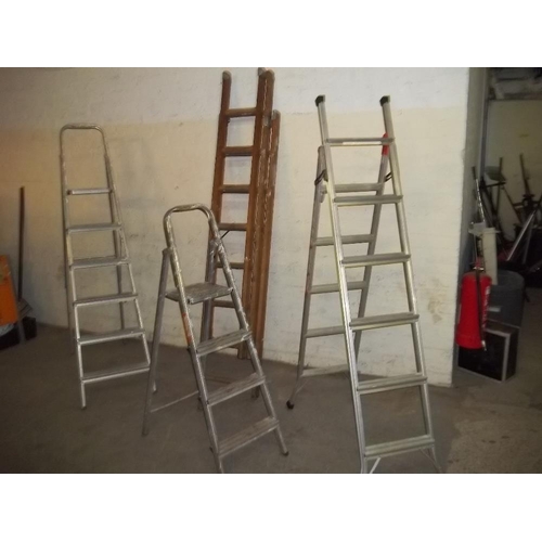 759 - THREE SETS OF ALUMINIUM STEP LADDERS AND 1 SET OF TRIPPLE WOODEN LADDERS