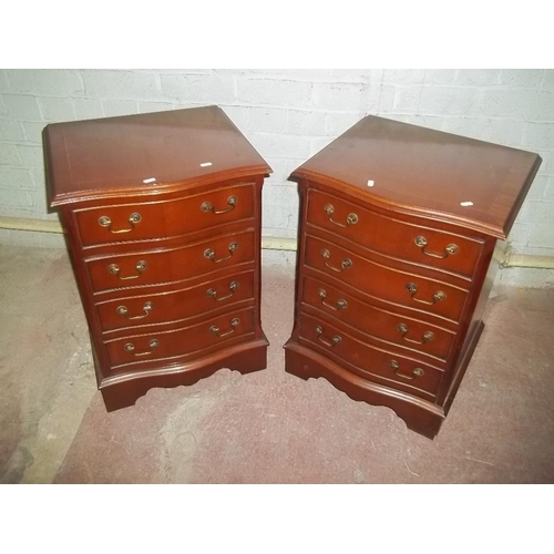 825 - A PAIR OF REPRODUCTION SERPENTINE FRONTED CHEST OF DRAWERS