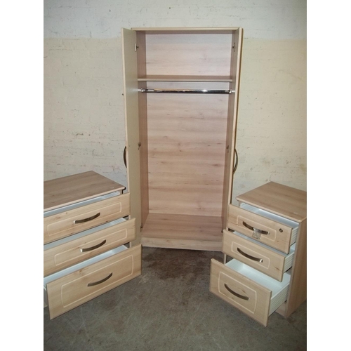 848 - A MODERN BEDROOM SUITE TO INCLUDE A 2 DOOR WARDROBE AND X 3 DRAWER CHESTS