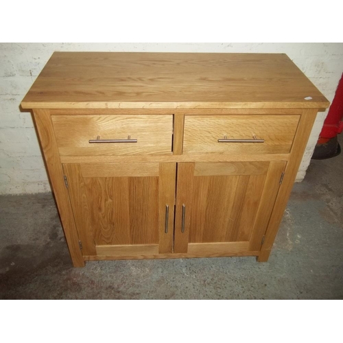 849 - A MODERN OAK SIDEBOARD CABINET