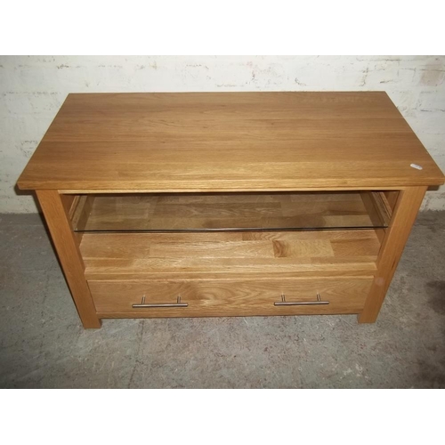 850 - A MODERN OAK TV UNIT CUPBOARD