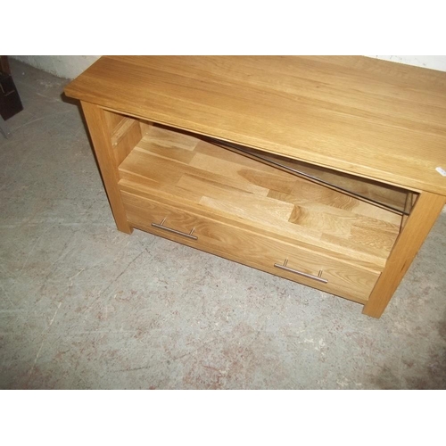 850 - A MODERN OAK TV UNIT CUPBOARD