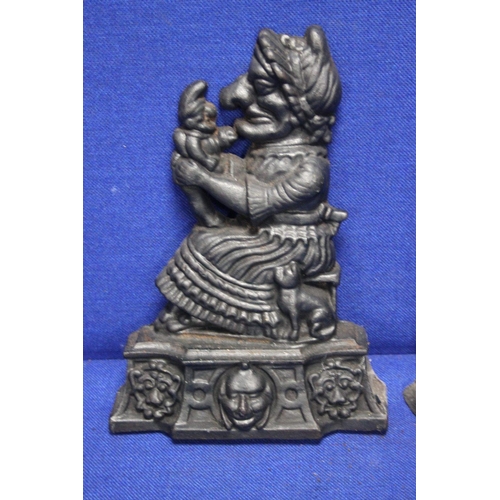 89 - A PAIR OF PUNCH AND JUDY DOOR STOPS