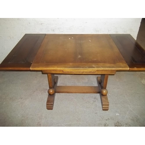 932 - AN OAK DRAWLEAF TABLE