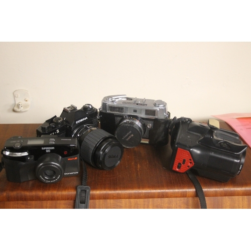 326 - A COLLECTION OF CAMERA'S AND  ACCESSORIES TO INCLUDE A COSINA CAMERA, OLYMPUS, FILMS, FILTERS, CAMER... 